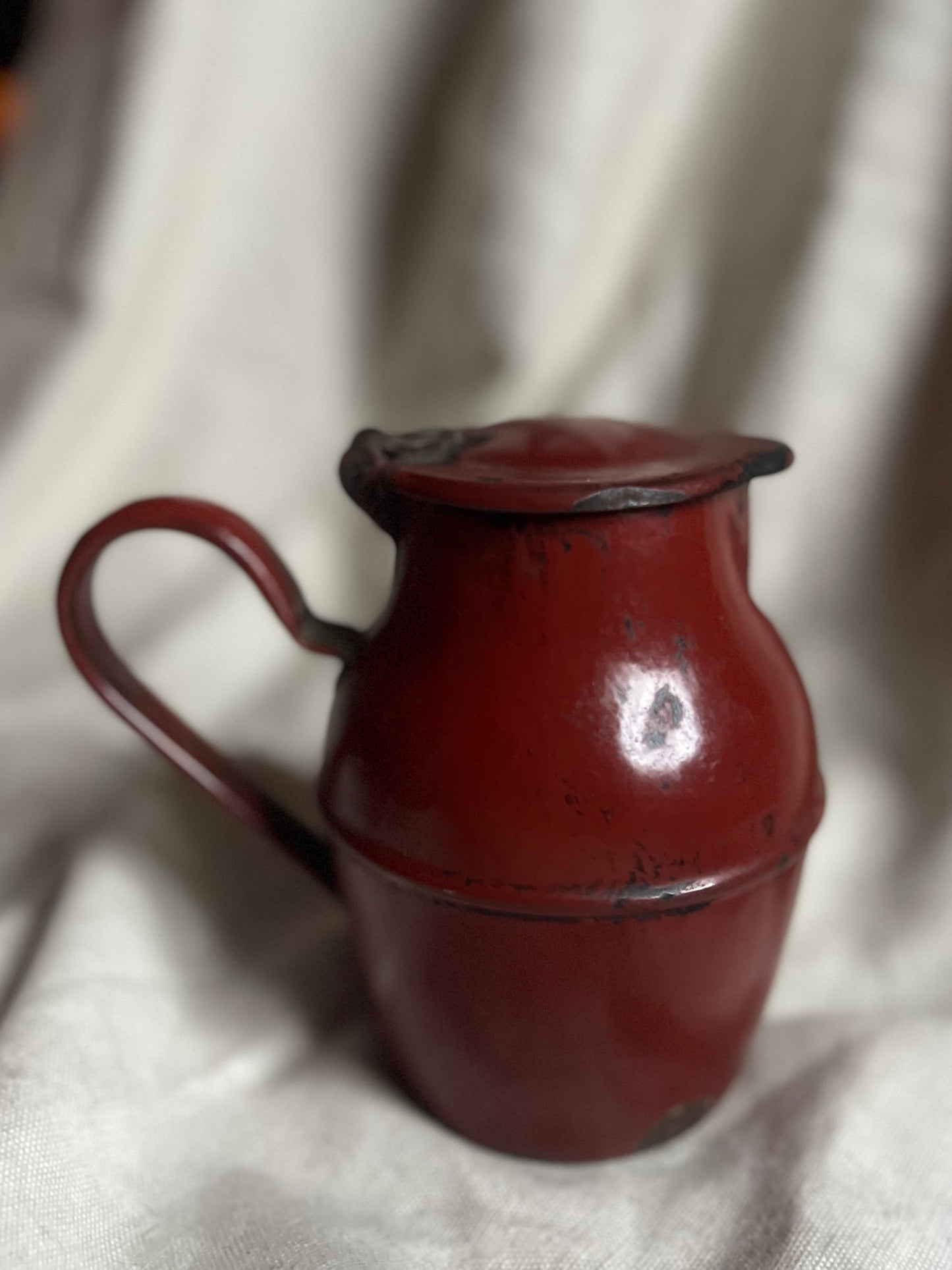 Red Metal Pitcher