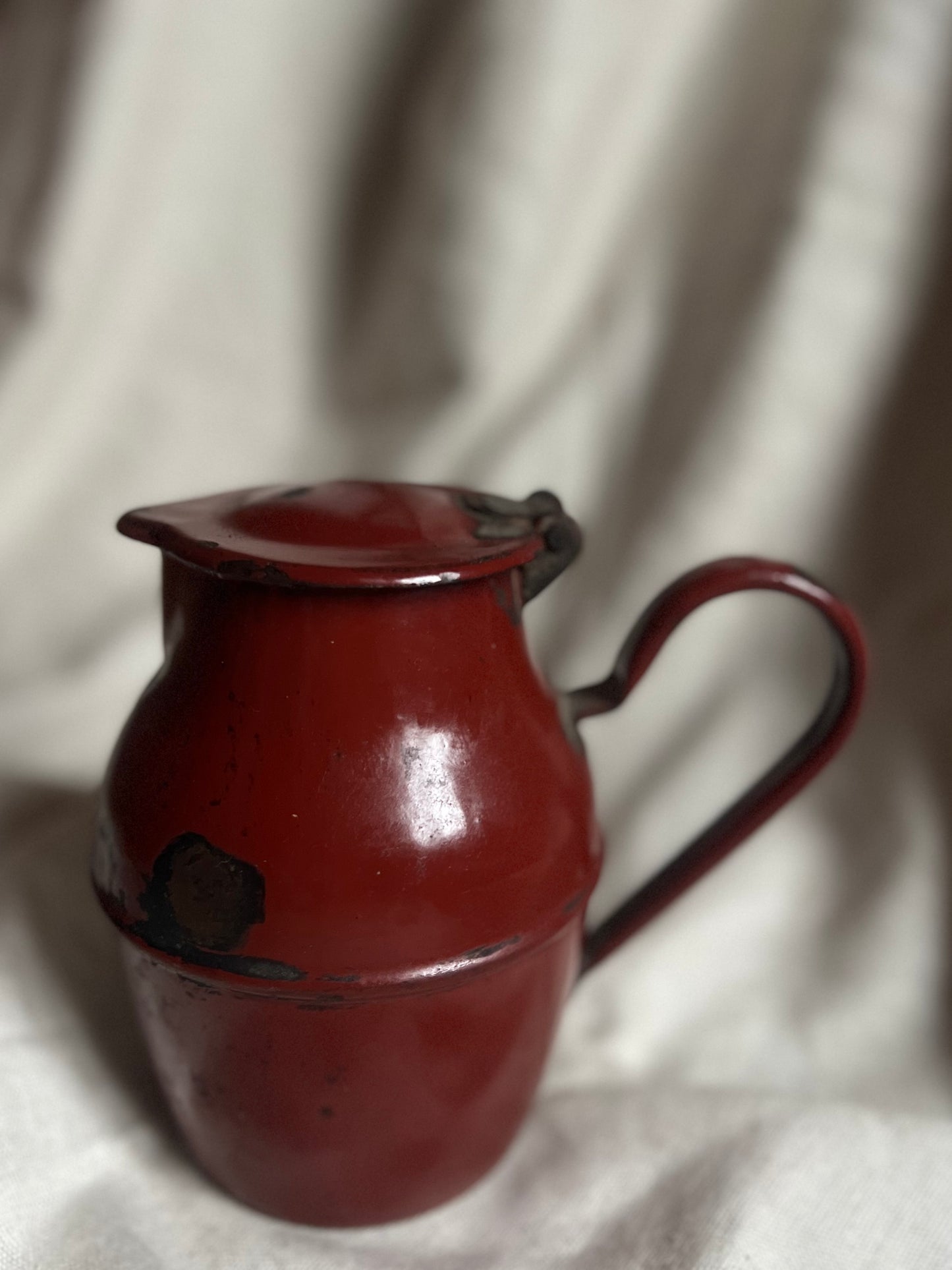 Red Metal Pitcher