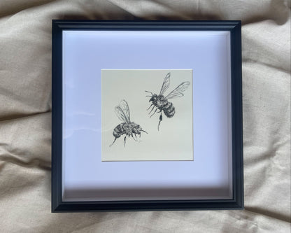 Black Frame with Two Bees